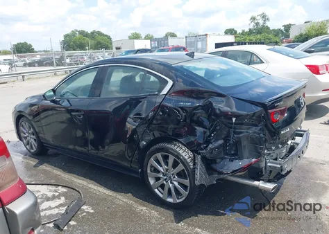 2021 Mazda Mazda3 Premium from USA, damaged, VIN JM1BPADL9M1305060
